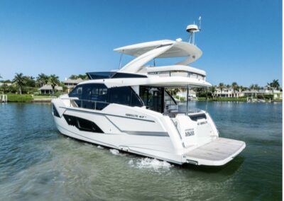 Take the plunge—Tailgate Time’s full-beam swim platform lowers into the Gulf for effortless water access and floating fun.